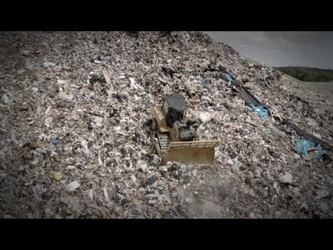 Steep Landfill Hill No Match for Cat® D6 XE Waste Handler Dozer